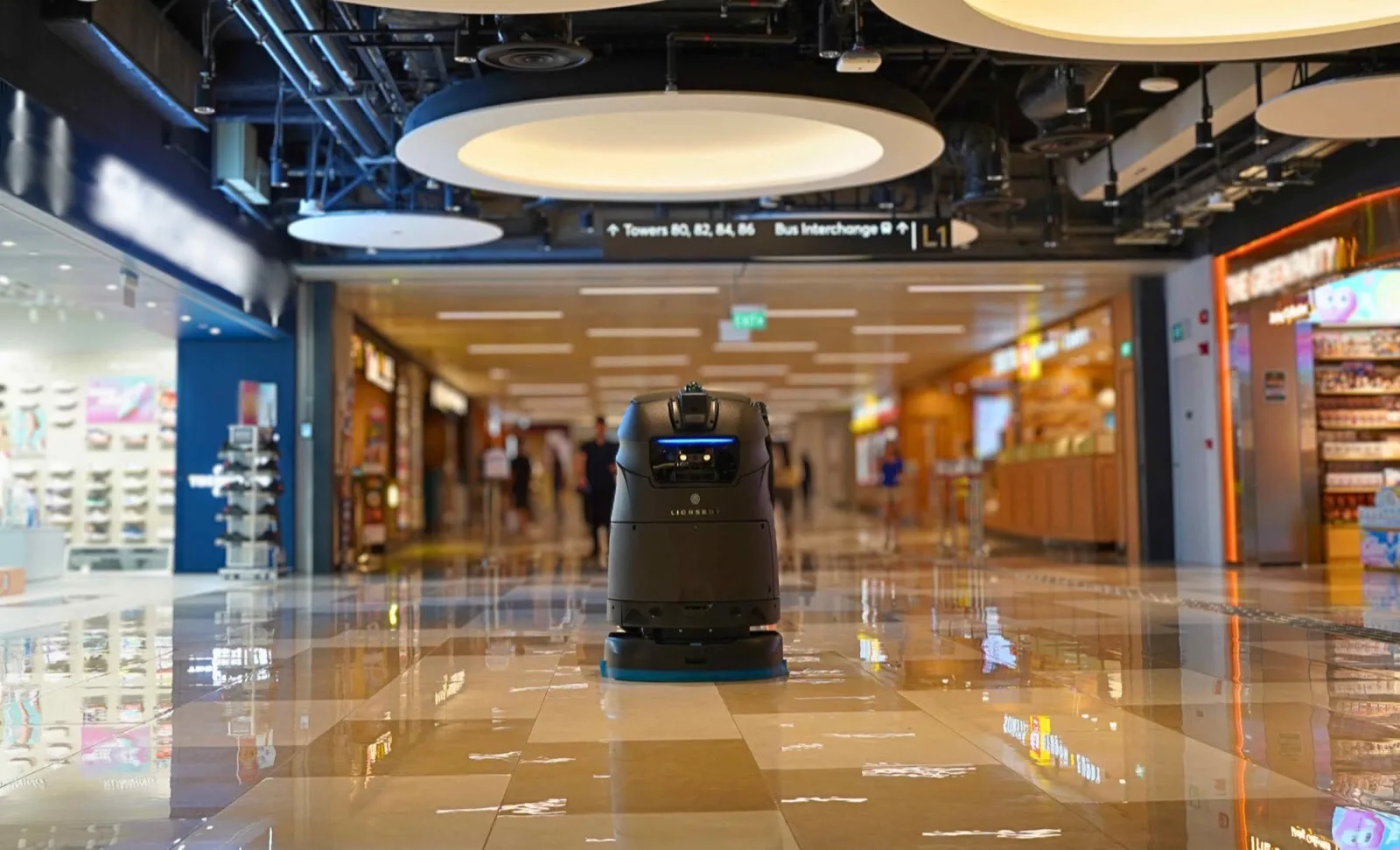 R5 robot cleaning a retail mall