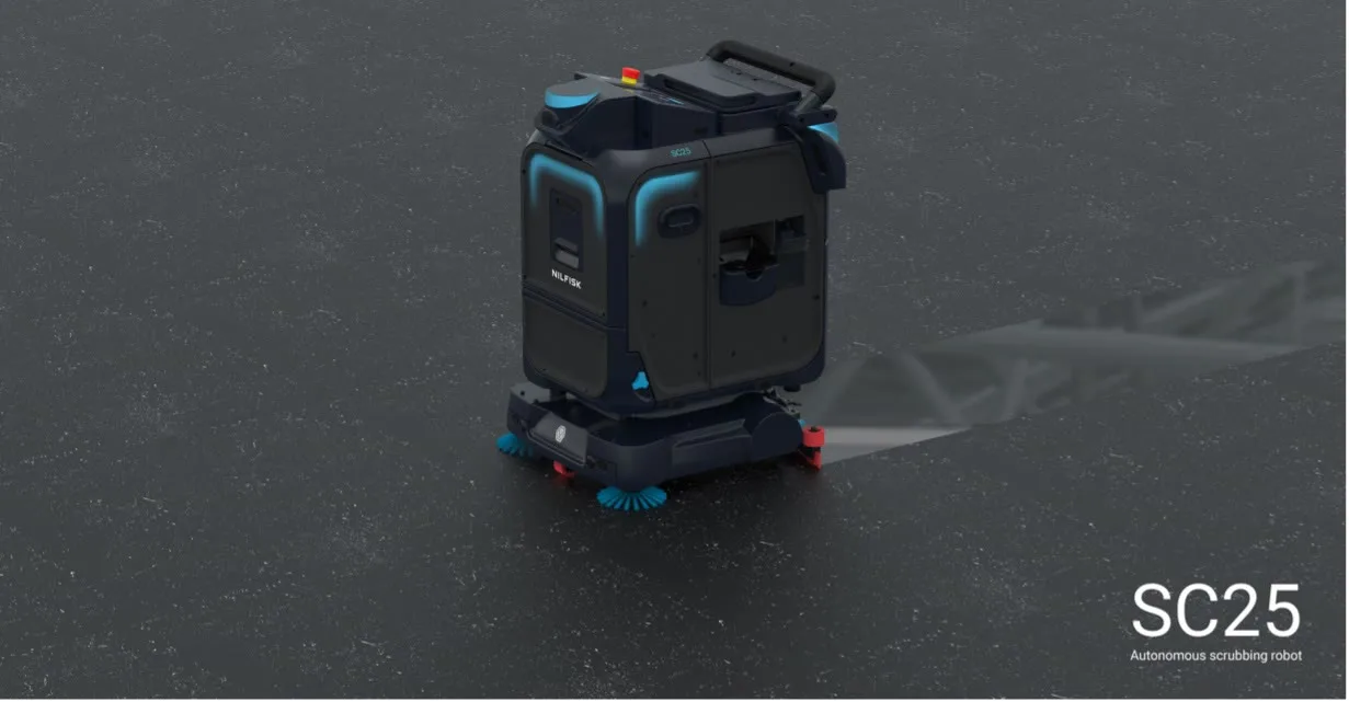 The Nilfisk SC25 autonomous scrubbing robot on a dark floor, shown at an angle with its side brushes extended