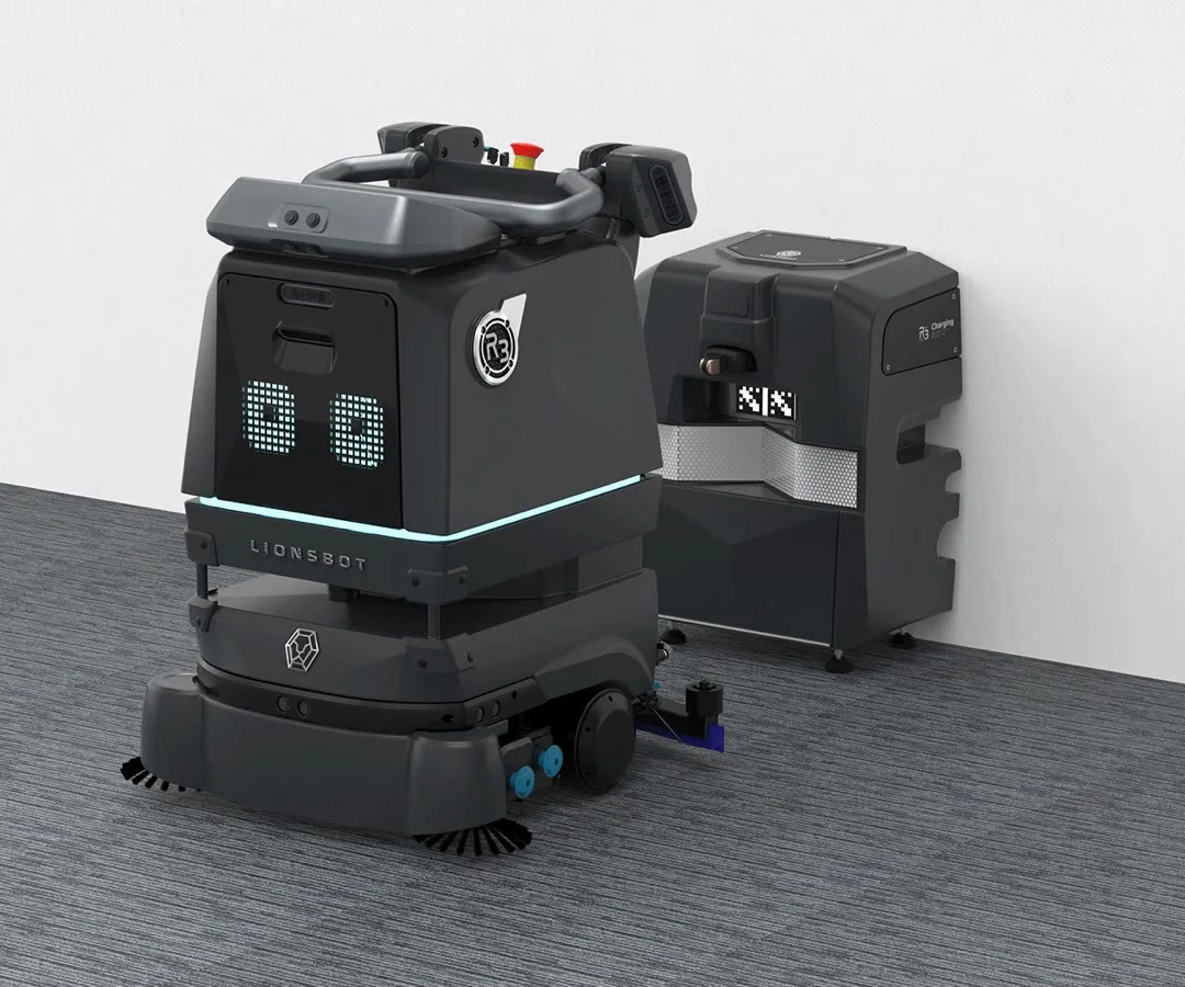 LionsBot R3 Scrub Pro compact autonomous floor scrubber beside its refuel station