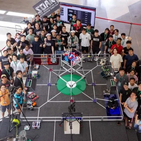Competitors and organisers gathered around the RoboClash arena at the Singapore University of Technology and Design